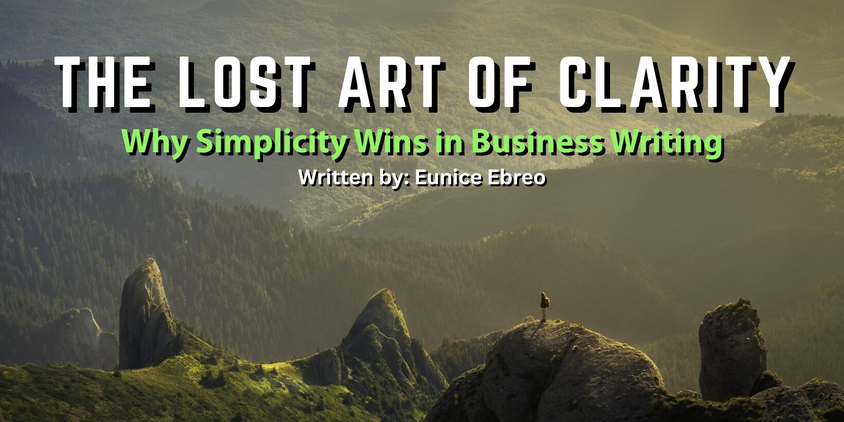 Mountain landscape with a lone figure standing on a cliff, symbolizing the power of clarity in business writing